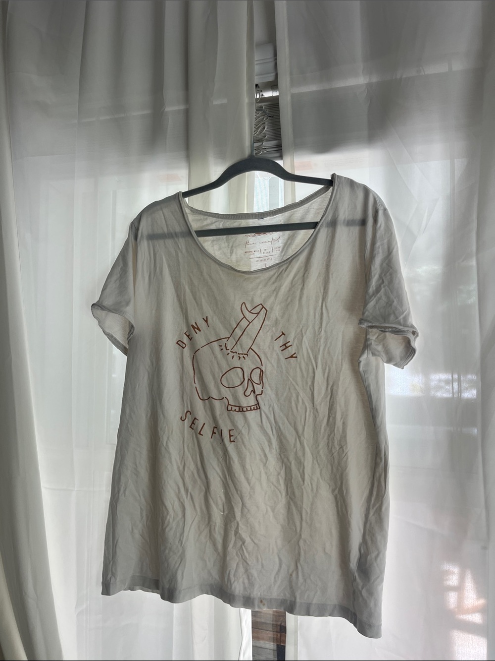 Graphic Tee — "Deny Thy Selfie" Skull Print in Cream
